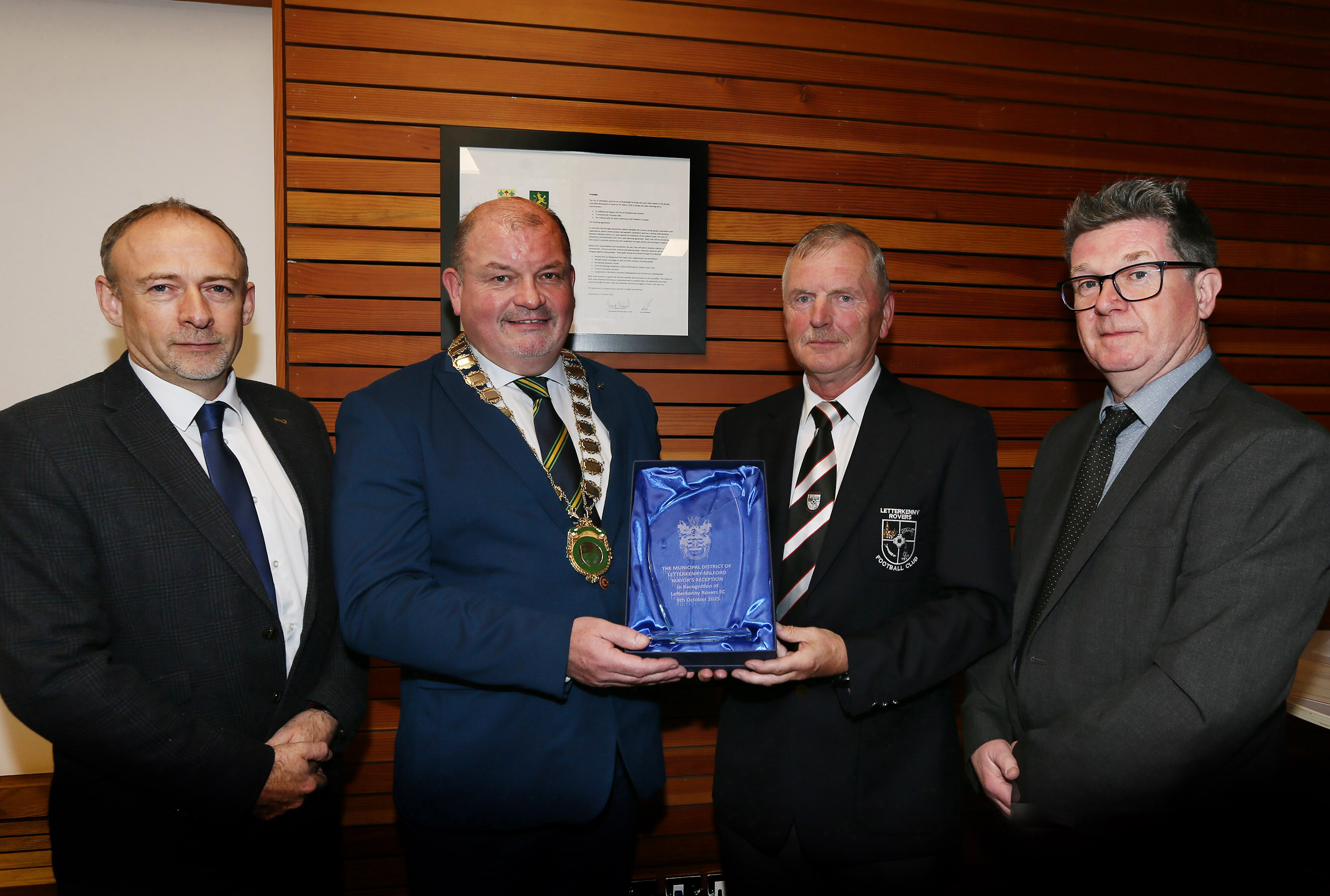 Mayor of Letterkenny-Milford Municipal District, Cllr Ciaran Brogan making a presentation of an inscribed glass plaque to Eamonn McConigley of Letterkenny Rovers who were given a Mayor's Reception on Thursday night in recognition of their treble winning season.  Also included are Eamonn Brown and Seamus Canning, Donegal County Council executives. Picture: Declan Doherty