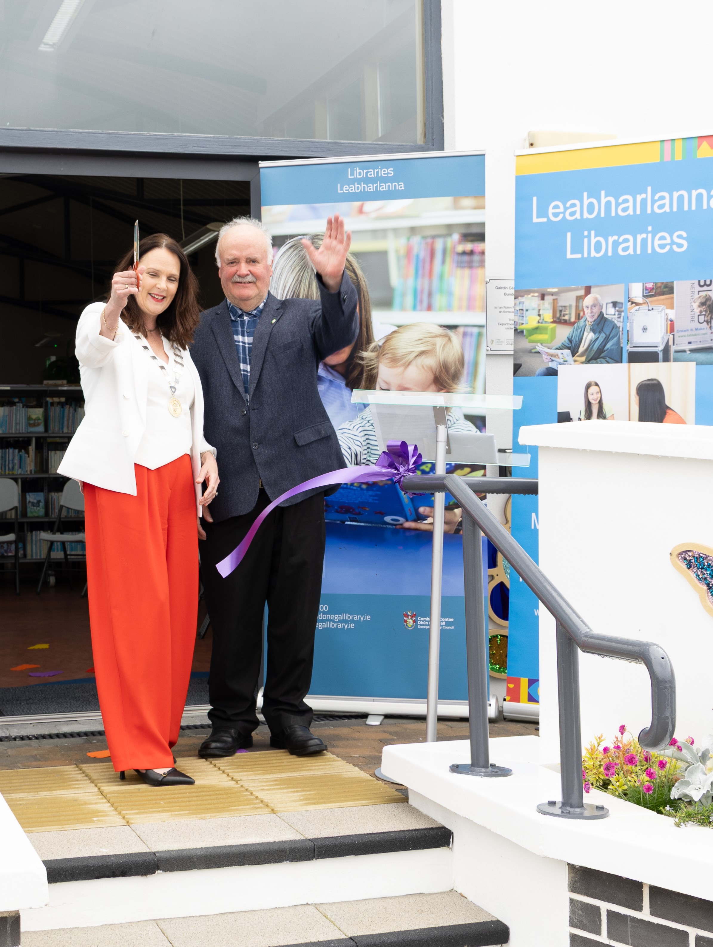 Cathaoirleach of Donegal County Council Cllr. Niamh Kennedy and Donegal County Councillor Michael Mc Mahon cutting the ribbon on the new sensory garden in Bundoran Community Library.