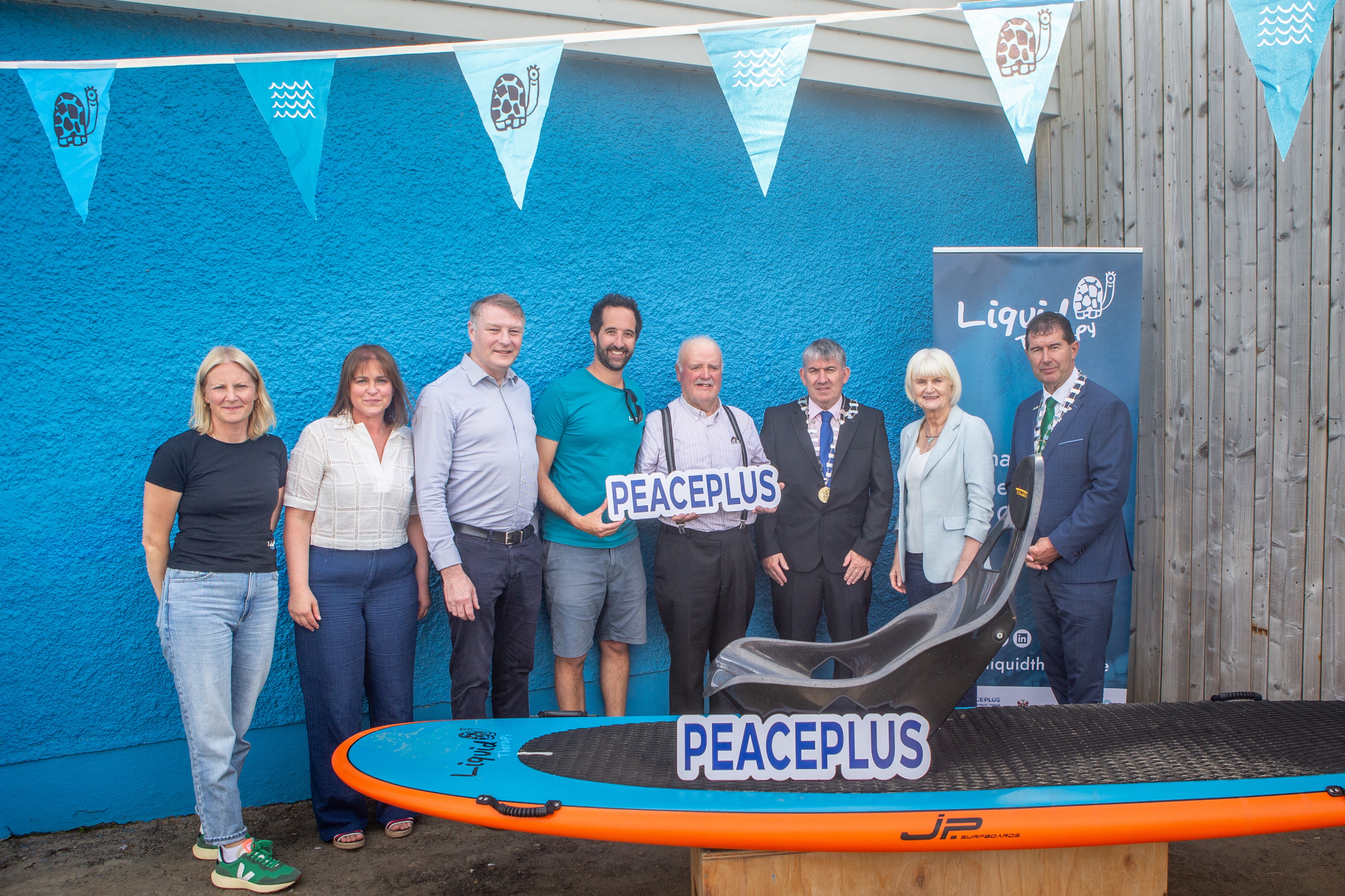 Cathaoirleach of Donegal County Council Cllr Paul Canning, Chair of the PEACEPLUS Committee; Cllr Michael Naughton, Cathaoirleach of the Donegal MD, and attendees at the launch of “We Can Believe”