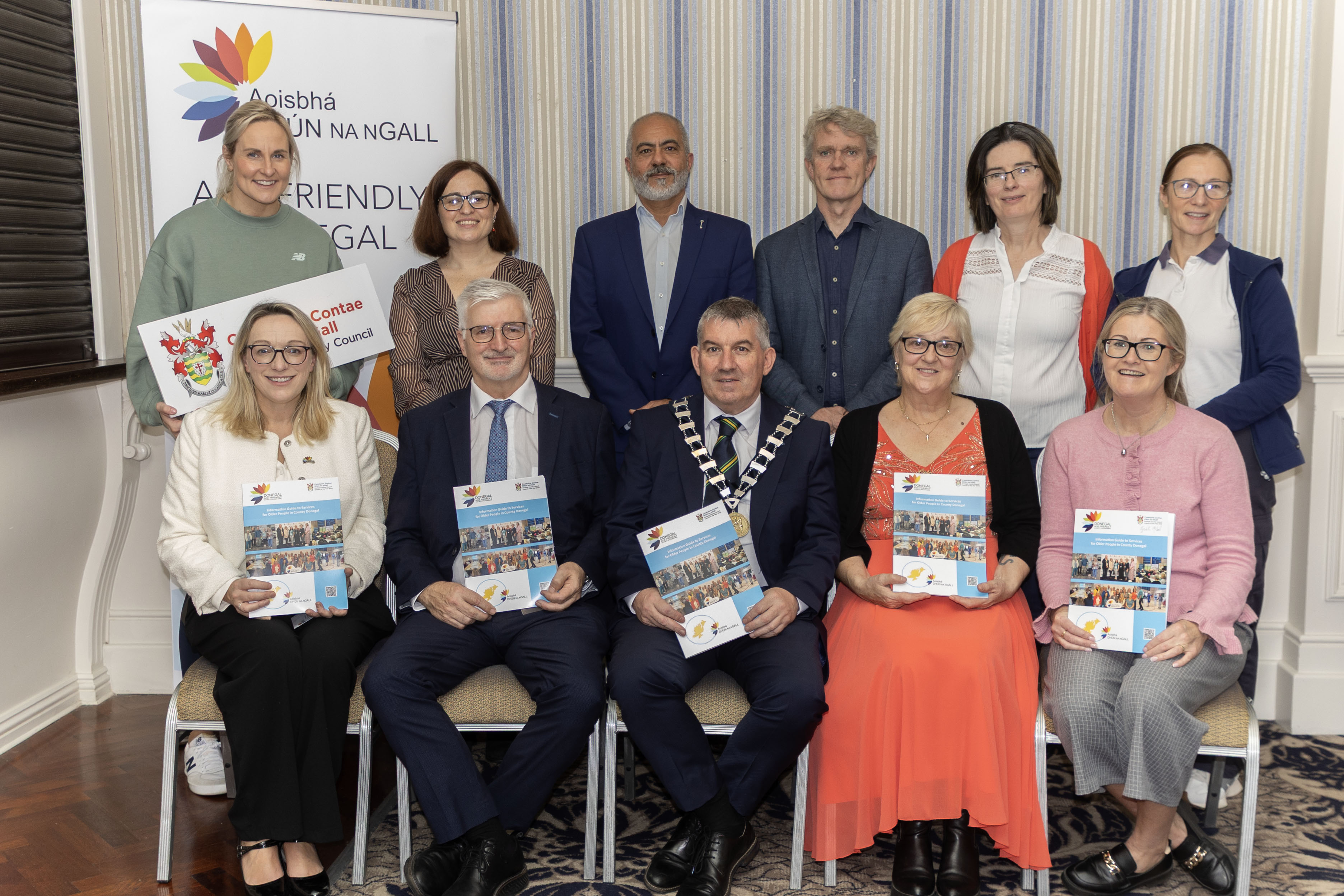 Seated L-R - Rosita Mahony Age Friendly Programme Manager Donegal, John G. McLaughlin Chair of Age Friendly Alliance, Cathaoirleach Cllr Paul Canning, Caroline McDaid Chairperson of the Older Persons Council, Mairead Cranley Regional Manager for Age Friendly Ireland. Standing left to right – Karen Guthrie Donegal Sports Partnership, Emma Kennedy, Healthy Homes Co-ordinator Fadl Mustapha Community Development, Aenghus Kennedy Nature North West, Mairead Lynch Community Development & Maeve McKeown HSE